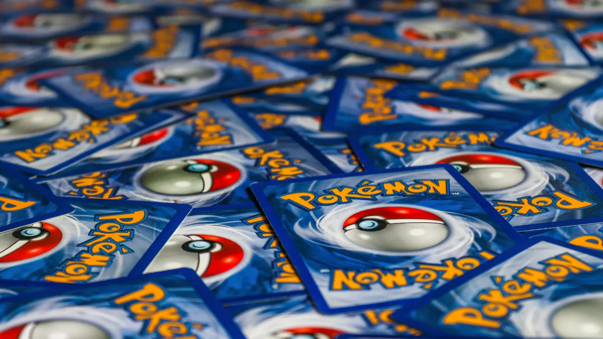 A vibrant display of Pokémon trading cards featuring the iconic Pokeball design.